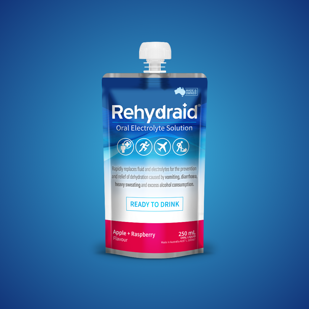 Rehydraid Oral Electrolyte Solution ready-to-drink pouch in apple and raspberry flavor, 250 mL. The packaging highlights it rapidly replaces fluid and electrolytes to relieve dehydration caused by vomiting, diarrhea, heavy sweating, and alcohol consumption. Suitable for physical activity and travel, made in Australia.